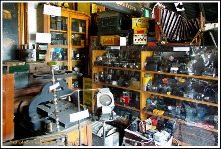 Some items are obviously from the Victorian era, but definitely not the Kodak Instamatics and other 35mm P&amp;S cameras in the display case - all under an inch of dust.