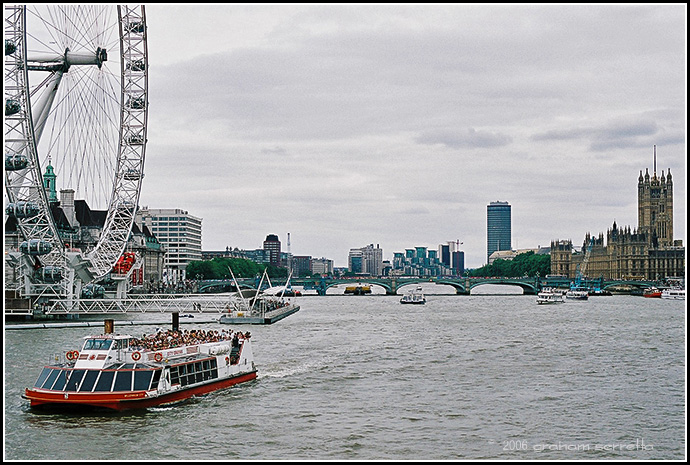 This is a familiar sight on the River Thames with the London Eye on the left and the Palace of Westminister on the right with Westminister Bridge crossing between them. The sightseeing boats ply back and forth all day every day, doing one trip every hour, always full to the gunnels. This one belongs to City Cruises.<br />*<br />*