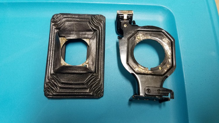 Put the original front ring on a similar but not exact New Old Stock replacement bellows.